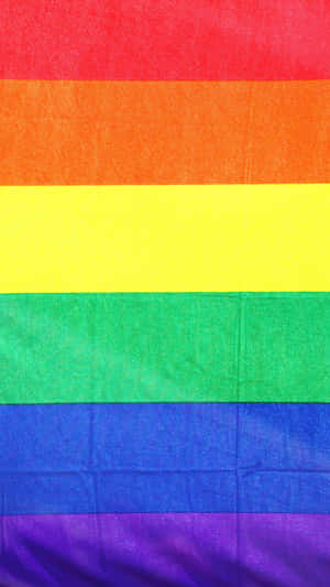 A Rainbow Flag With A Rainbow On It Wallpaper