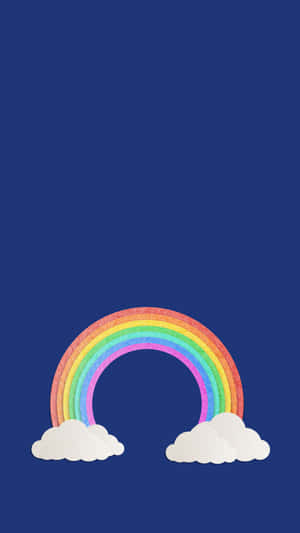 A Rainbow With Clouds On A Blue Background Wallpaper