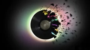 A Record Is Broken Into Pieces In A Dark Room Wallpaper