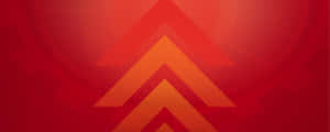 A Red And Orange Arrow Logo Wallpaper