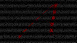 A Red Letter A On A Black Background Wallpaper