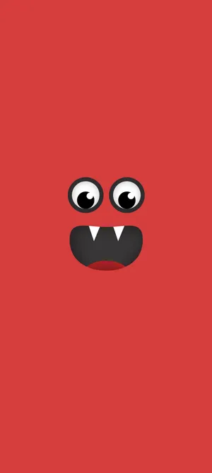 A Red Monster Face With Black Eyes Wallpaper