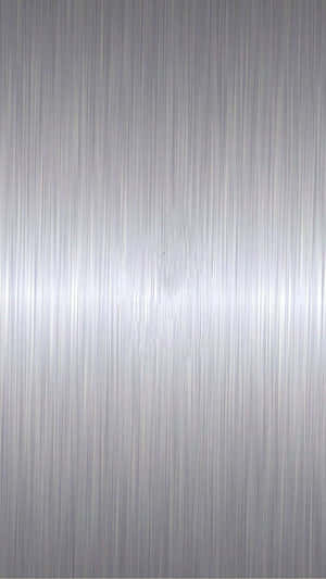 A Silver Metal Background With A Textured Surface Wallpaper