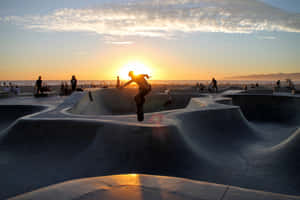 A Skateboarder Doing Tricks Wallpaper