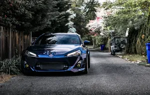 A Sleek Toyota 86 With Matte Black Finish Wallpaper