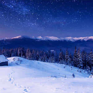 A Snowy Landscape With A Cabin And Stars Wallpaper