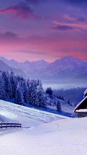 A Snowy Landscape With A House And A Fence Wallpaper