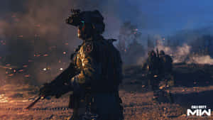 A Soldier Is Standing In The Middle Of A Fire Wallpaper