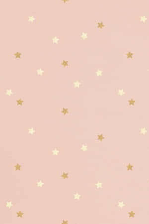 A Soothing Gradient Background Of Light Pink And Gold Wallpaper