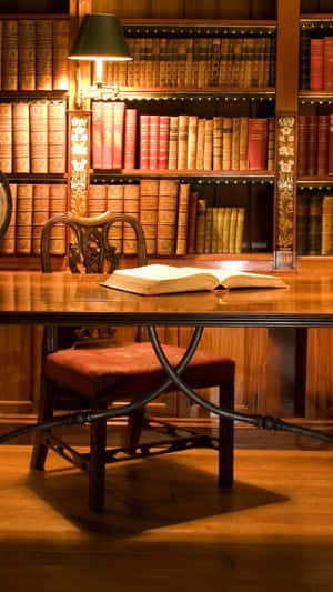 A Stack Of Illustrated Books Against An Iphone 11 Pro Background Wallpaper