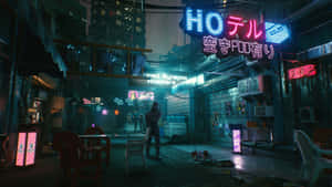 A Street Scene With Neon Signs And Tables Wallpaper