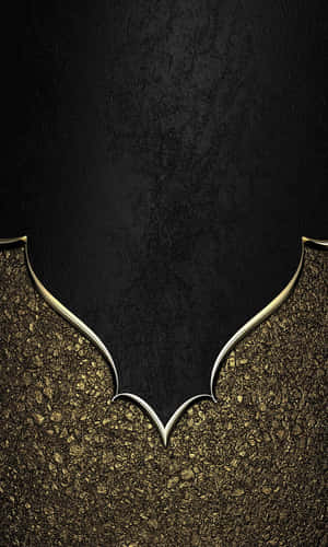A Stunning Combination Of Elegant Black And Luxurious Gold Wallpaper