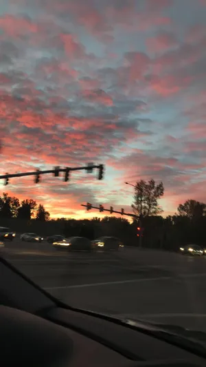 A Stunning View Of The Sun Setting Over An Endless Horizon. Wallpaper