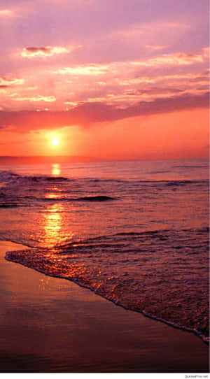A Sunset On The Beach Wallpaper