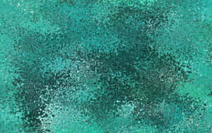 A Teal Aesthetic Laptop With Colorful Wallpapers Wallpaper