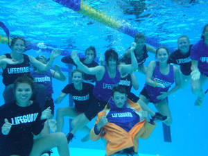 A Team Of Lifeguards Underwater Training Wallpaper