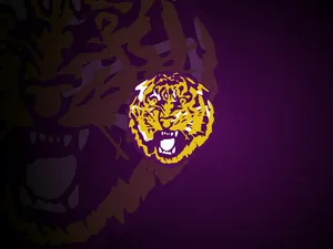 A Tiger Logo On A Purple Background Wallpaper