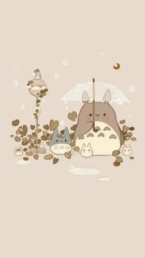 A Totoro And A Cat Are Sitting Under An Umbrella Wallpaper