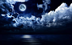 “a Tranquil Night By The Sea, Bathed In Moonlight.” Wallpaper