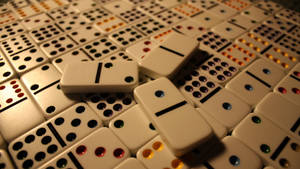 A Trio Of Dominos In Strategic Alignment Wallpaper
