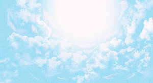 A Vast Blue Sky Surrounds The Heavenly Clouds Wallpaper