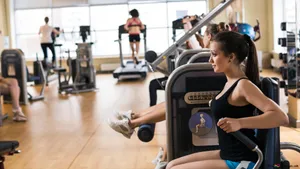 A Vibrant And Inviting 4k Gym Packed With Modern Fitness Equipment Wallpaper