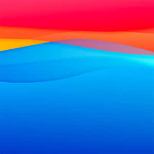 A Vibrant Blend Of Orange And Blue Merging In Harmony. Wallpaper