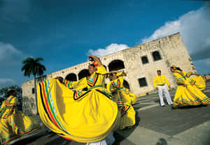 A Vibrant Celebration At The Historic Alcazar De Colon Wallpaper