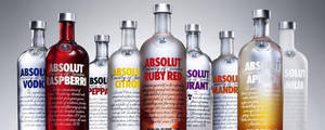 A Vibrant Collection Of Absolut Vodka Bottles Wallpaper