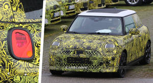 A Vibrant Mini Cooper Painted In Green And Black Art Pattern Wallpaper