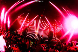 A Vibrant Nightclub Pulsating With Energy. Wallpaper