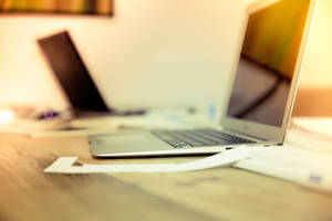 A Vibrant Workspace: Yellow Themed Office Desk Wallpaper