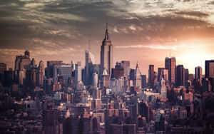 A View Of A Bustling City Rooftop Wallpaper