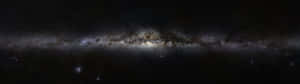 A View Of The Night Sky From The Edge Of A Cliff Wallpaper