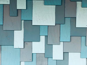 A Wall Of Blue Rectangular Plates Wallpaper