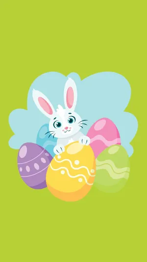 A White Bunny Is Sitting In A Group Of Colored Eggs Wallpaper