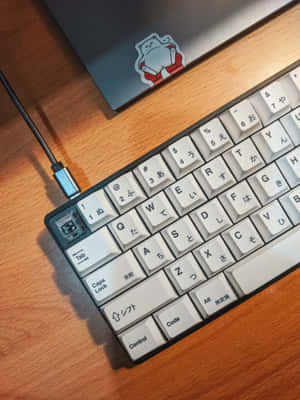 A White Keyboard With A Mouse On It Wallpaper