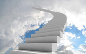 A White Stairway Leading To A Cloudy Sky Wallpaper