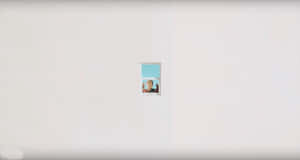 A White Wall With A Picture Of A Woman In A Window Wallpaper