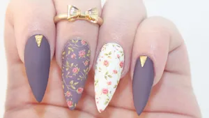 A Woman Holding Up A Flower Nail Art Design Wallpaper