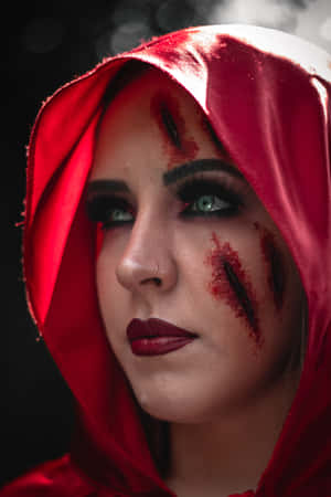 A Woman In Red Riding Hood Makeup Wallpaper