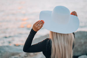 A Woman In Simple White Aesthetic Wallpaper