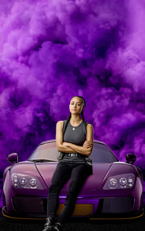 A Woman Sitting On Top Of A Purple Sports Car Wallpaper