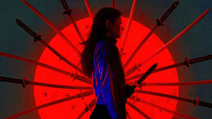 A Woman Standing In Front Of A Red Light With A Sword In Her Hand Wallpaper