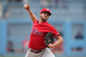 Aaron Nola Pitching A Baseball Wallpaper