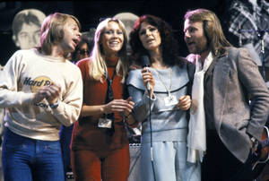 Abba Singing On Stage Wallpaper