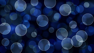 Abstract Blue Glitter Explosion Wallpaper