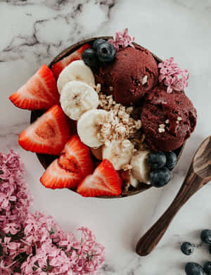 Acai Bowlwith Fresh Fruitsand Granola Wallpaper