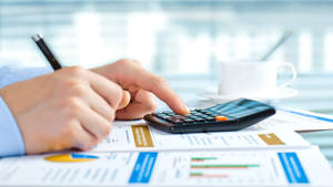 Accounting Charts And Calculator Wallpaper