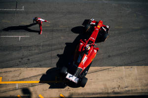 Ace Racing Champion Sebastian Vettel From A Bird's Eye View Wallpaper